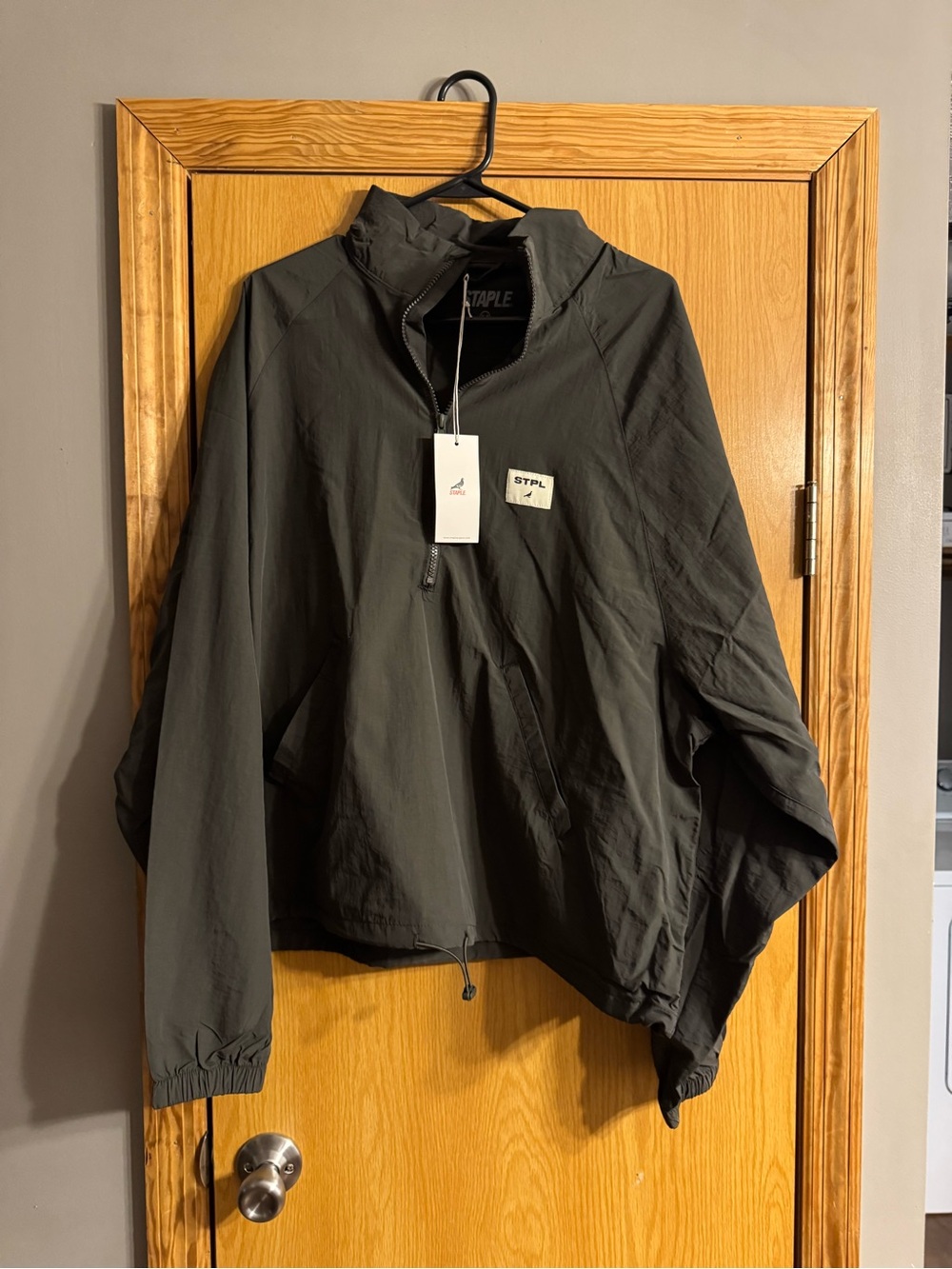 NWT Staple Pigeon Men’s quarter zip windbreaker jacket. Size medium.